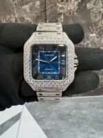 Discover the Moissanite Cartier Santos Watch with a stunning blue dial, luxury-inspired design, and brilliant moissanite stones. A bold, elegant timepiece perfect for collectors and fashion lovers.