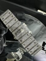 Discover the Moissanite Cartier Watch Fully Iced Out in White, featuring brilliant moissanite stones, a luxury-inspired design, and a sleek, polished white finish. A standout timepiece for bold, elevated style.