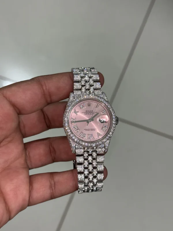 Explore the Custom Moissanite Rolex Lady-Datejust featuring brilliant moissanite stones, elegant craftsmanship, and a timeless luxury design. A stunning iced-out women’s watch built for elegance and shine.