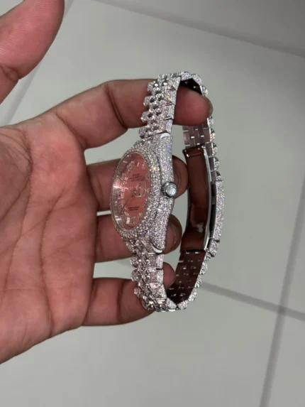 Explore the Custom Moissanite Rolex Lady-Datejust featuring brilliant moissanite stones, elegant craftsmanship, and a timeless luxury design. A stunning iced-out women’s watch built for elegance and shine.